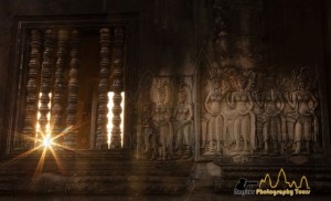 Devatas at sunrise in Angkor Wat temple