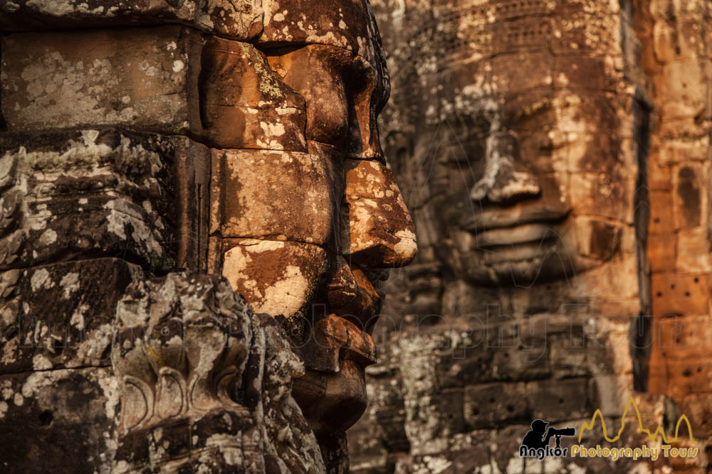 bayon stone faces golden hour