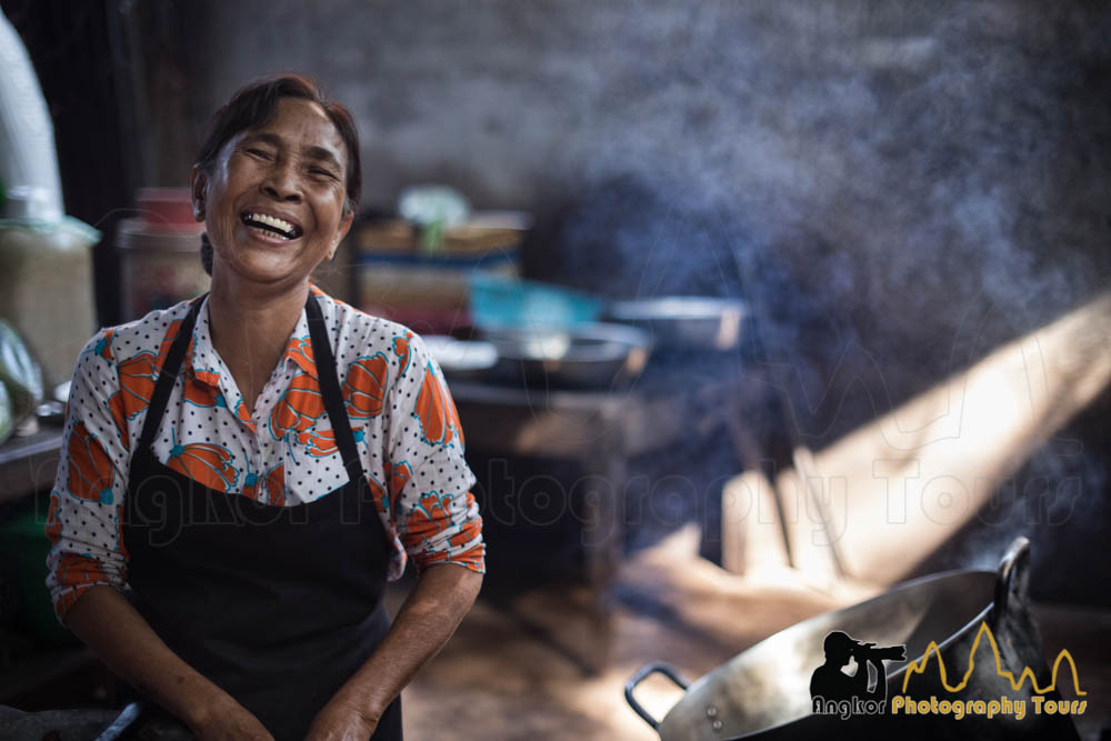 cook in local market siem reap