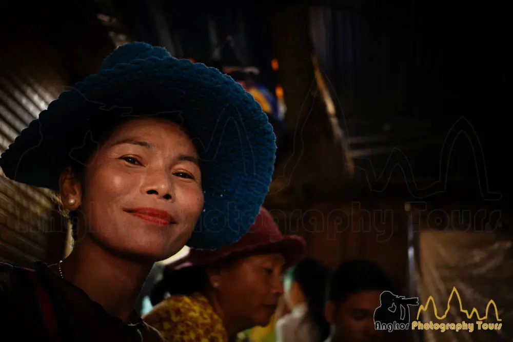 smiling khmer woman in a local market