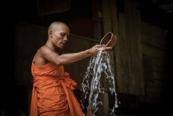 monk water blessing cambodia
